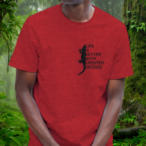 Man wearing a heather red Crested Gecko shirt from the Life is better Collection