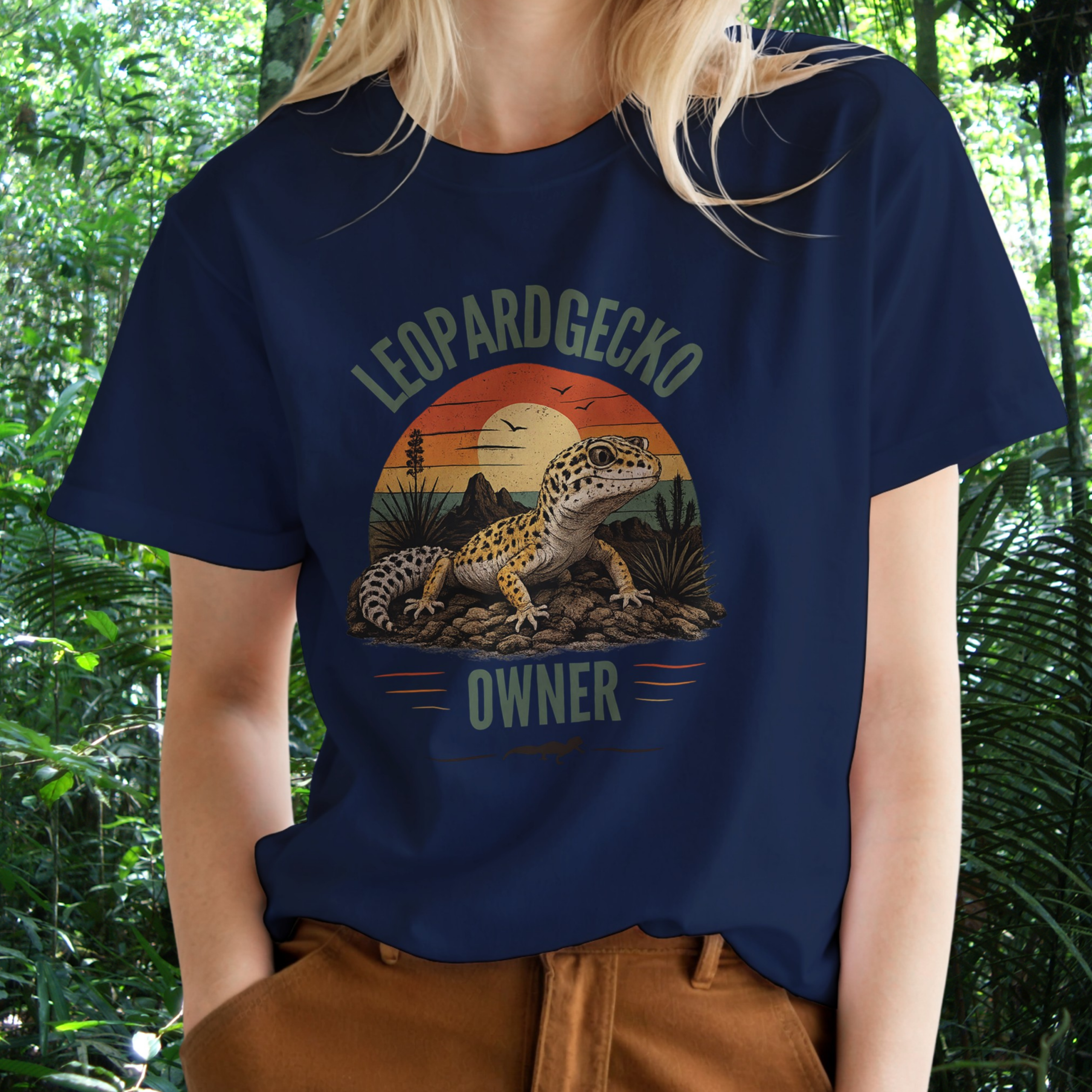 Woman wearing a navy Leopard Gecko Owner shirt