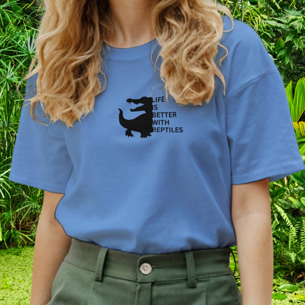Woman wearing a Carolina blue Reptile shirt from the Life is better Collection