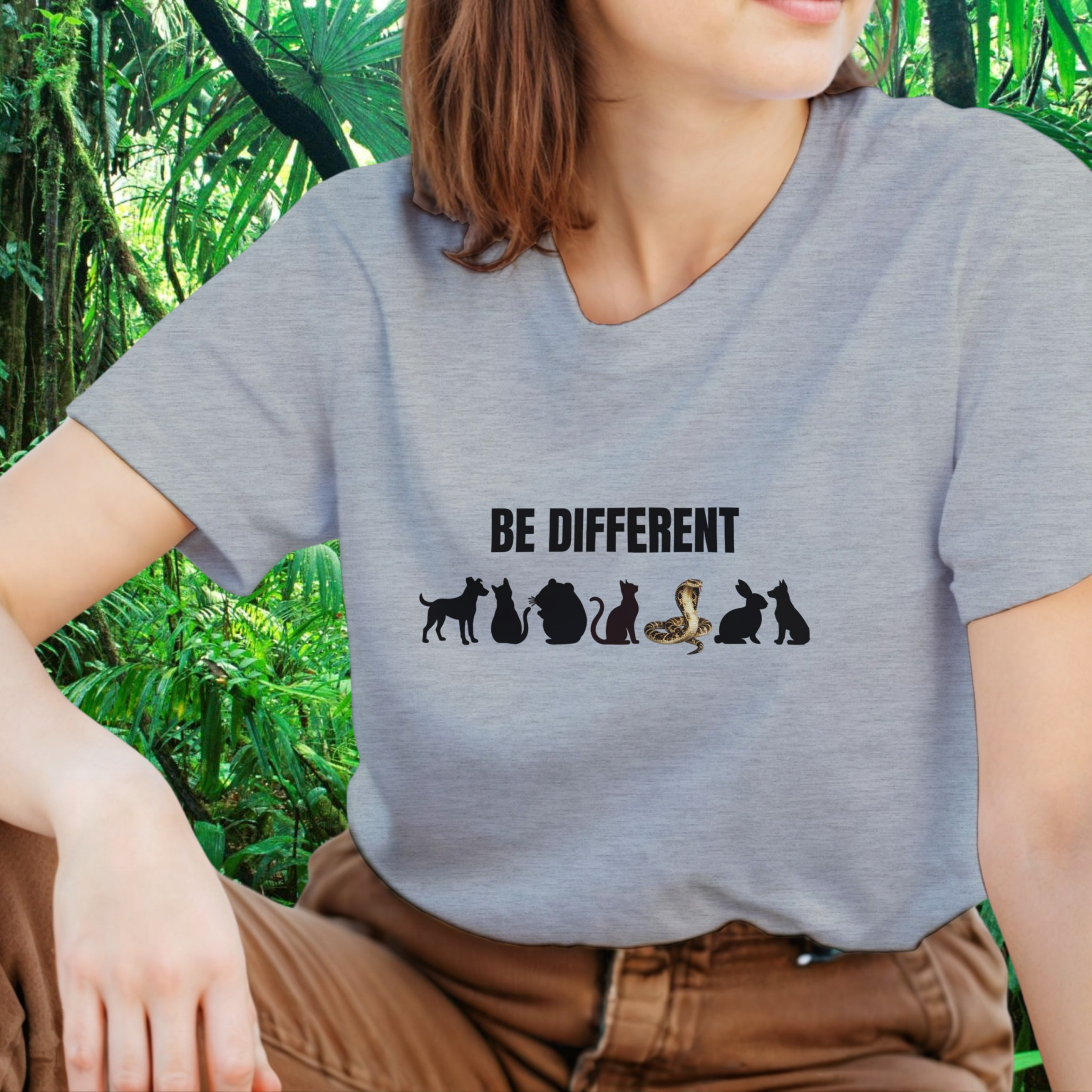 Woman wearing an ash Be Different Snake shirt