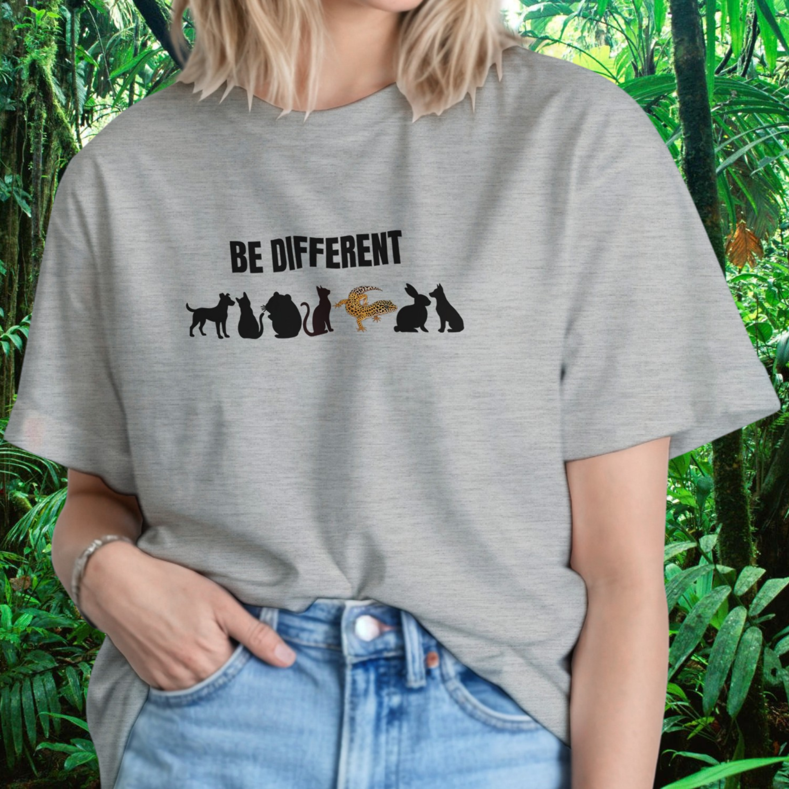 Woman wearing an ash Be Different shirt with reptile design