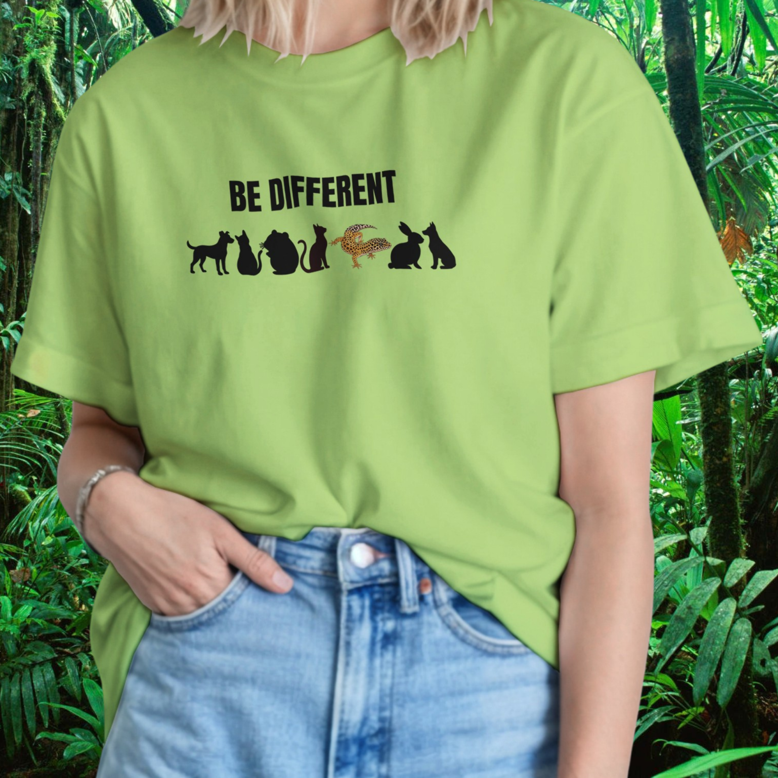 Woman wearing a kiwi Be Different shirt with reptile design