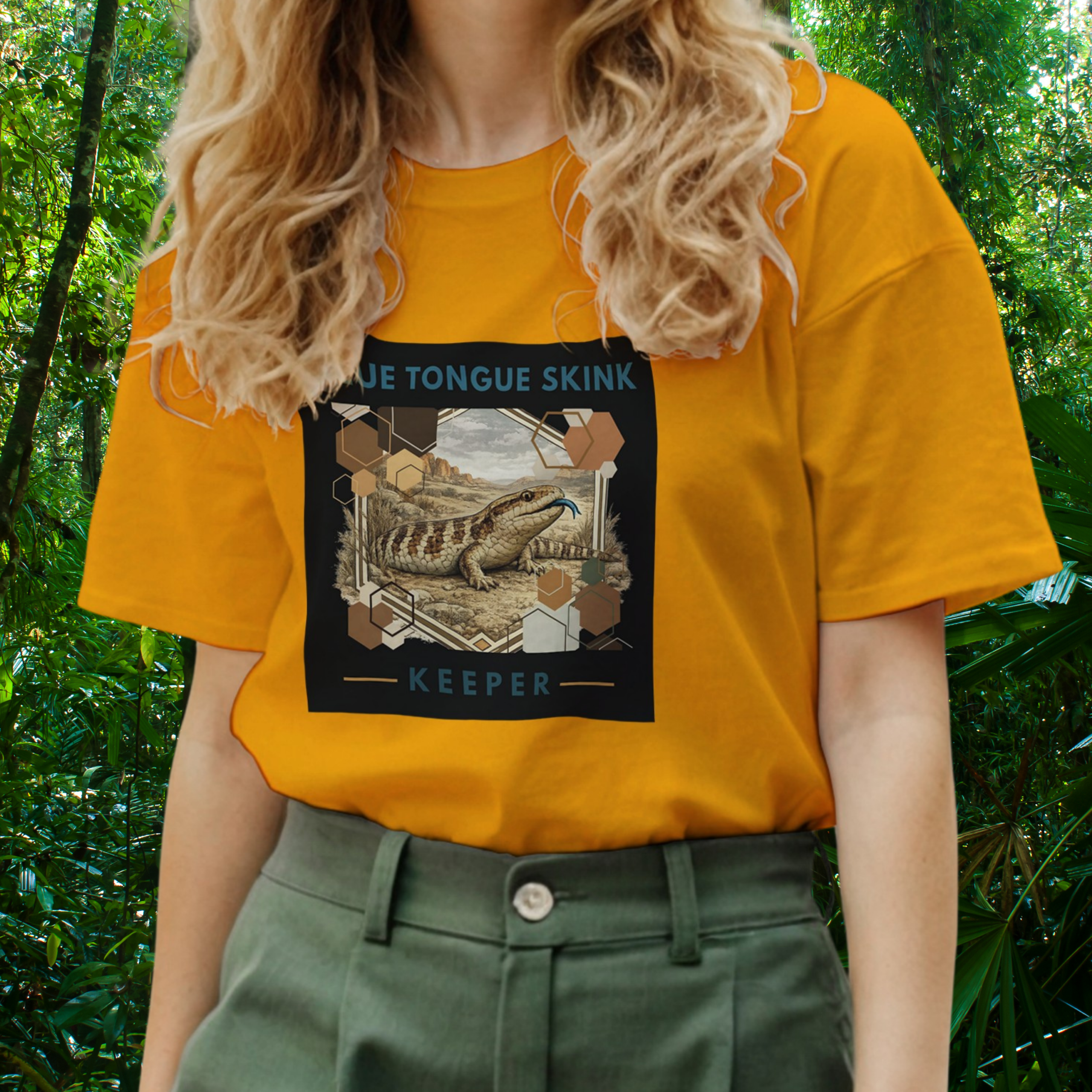 Woman wearing a gold Blue Tongue Skink shirt from the Keeper Collection