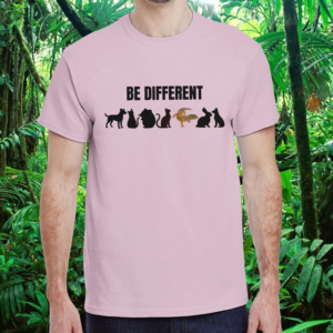 Be different Collection – Be Different Shirt – Light Pink – Man Man wearing a light pink Be Different shirt with reptile design