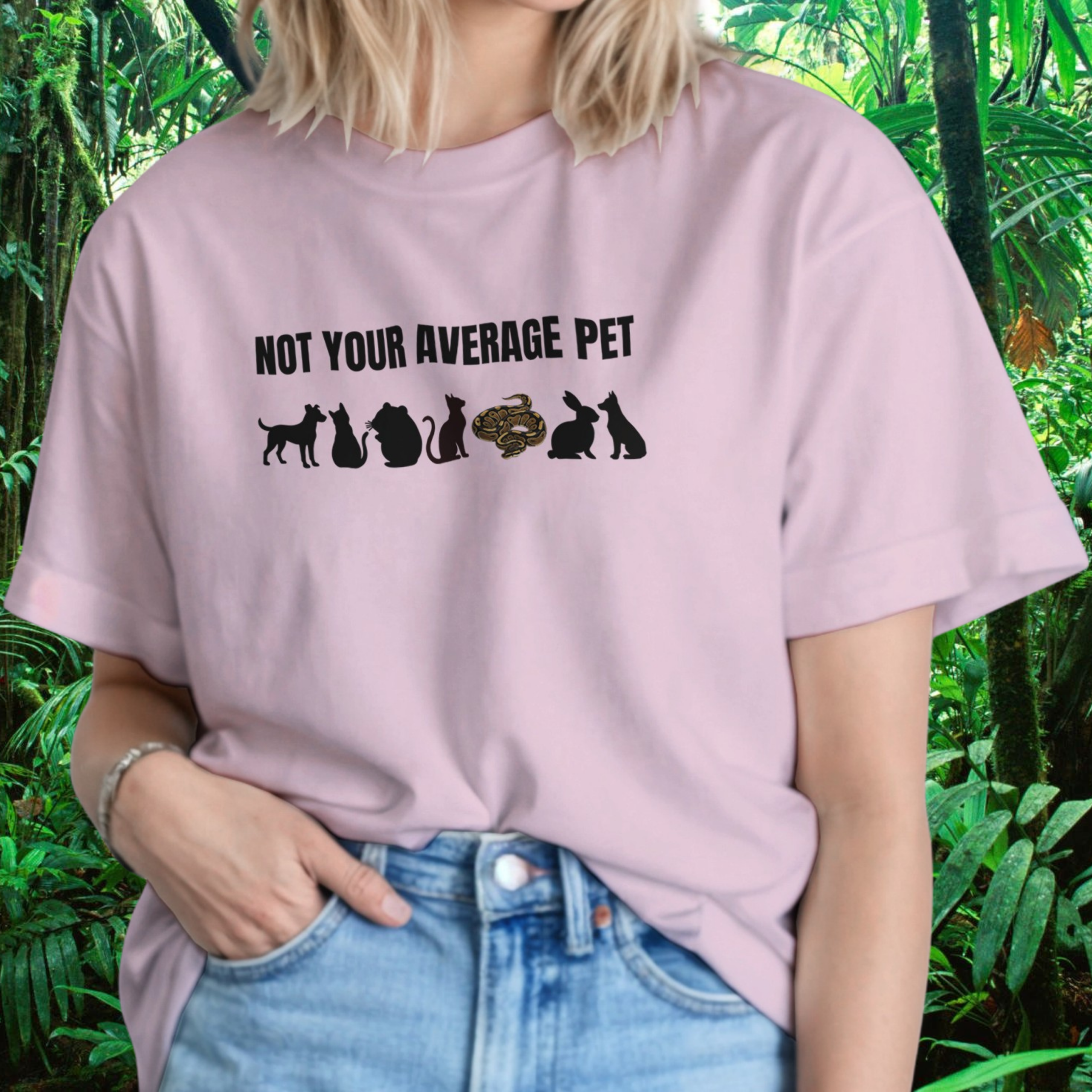 Woman wearing a light pink Not Your Average Pet Ball Python shirt