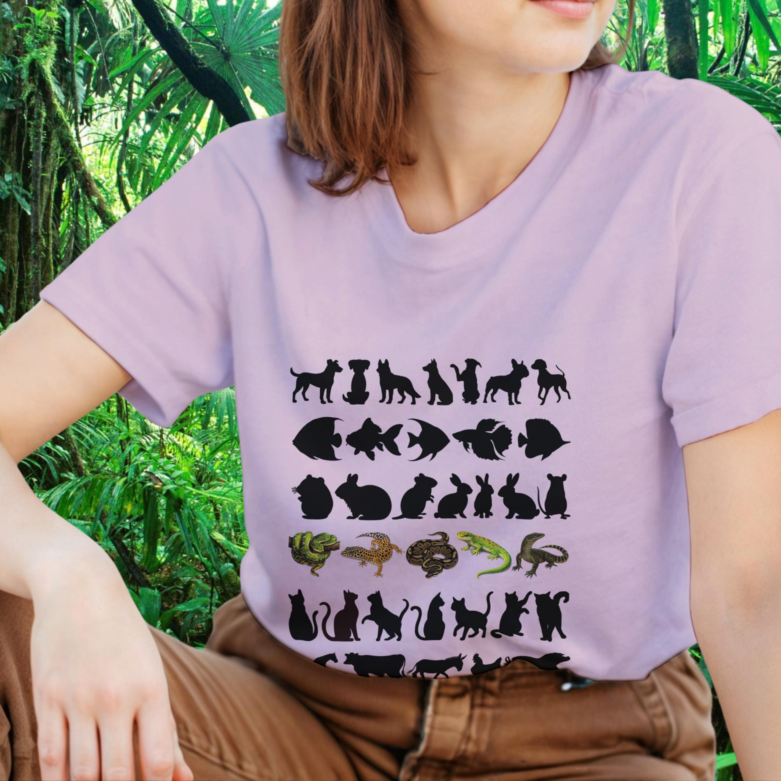 Woman wearing a light pink Not Your Average Pet shirt