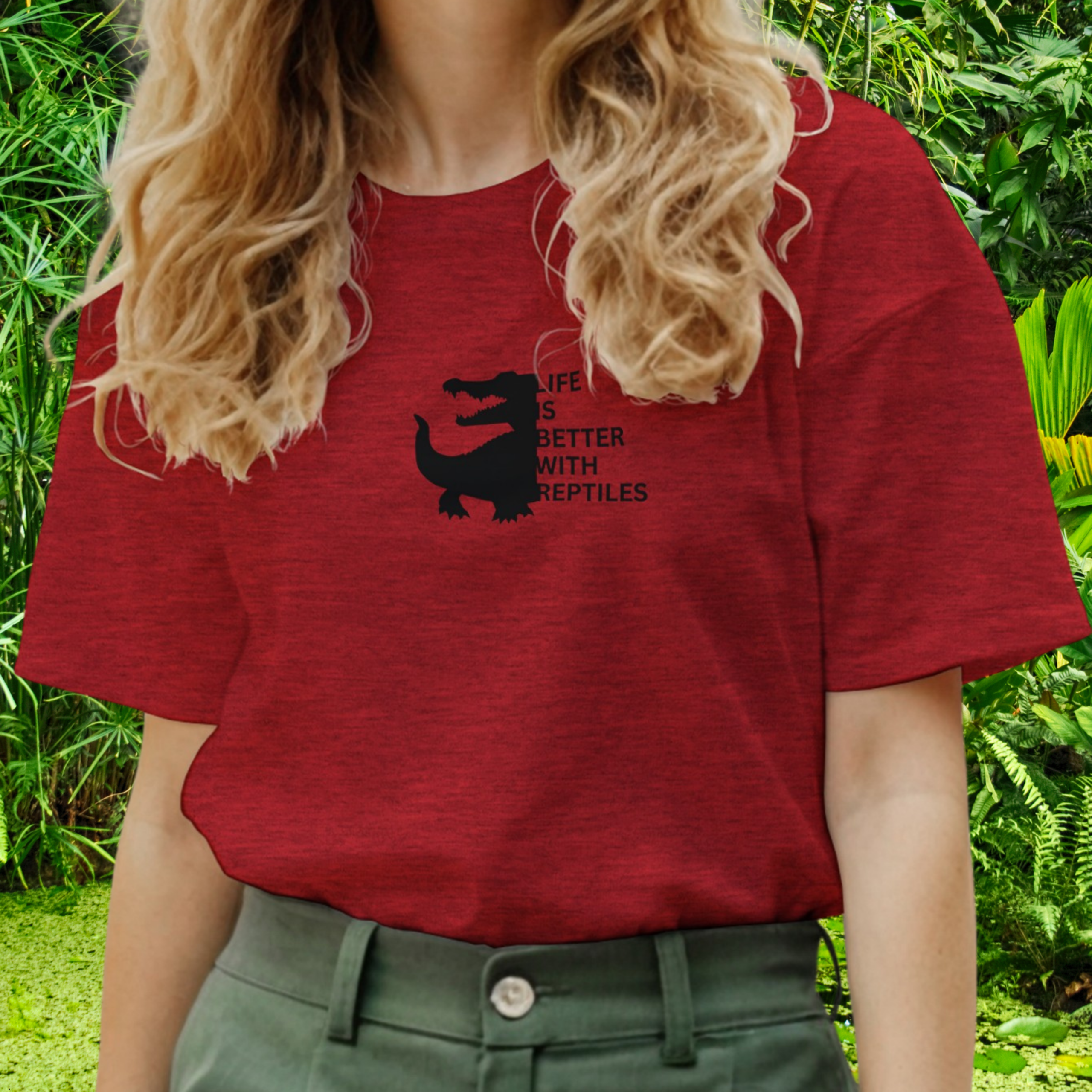 Woman wearing a heather red Reptile shirt from the Life is better Collection
