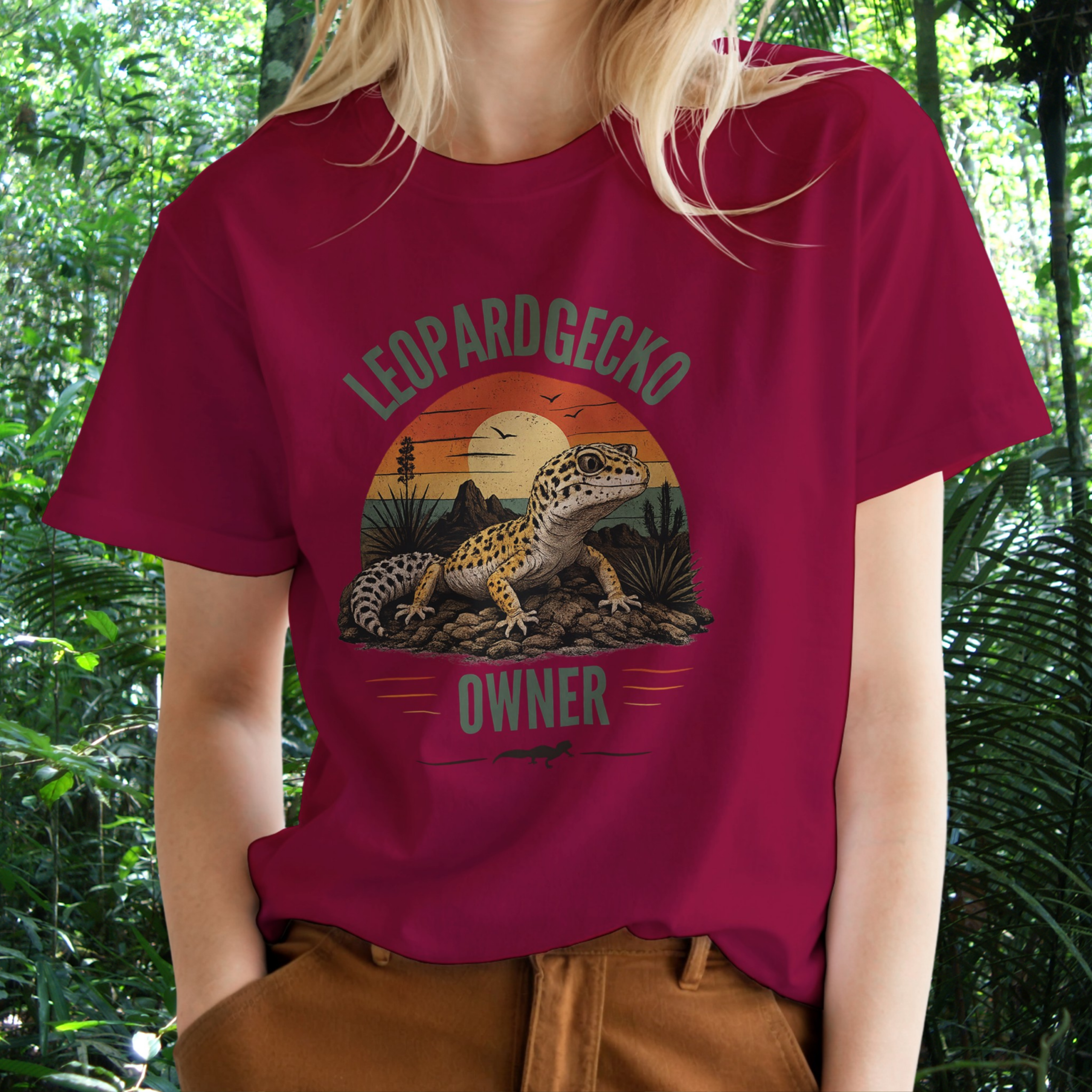 Woman wearing a cardinal red Leopard Gecko Owner shirt