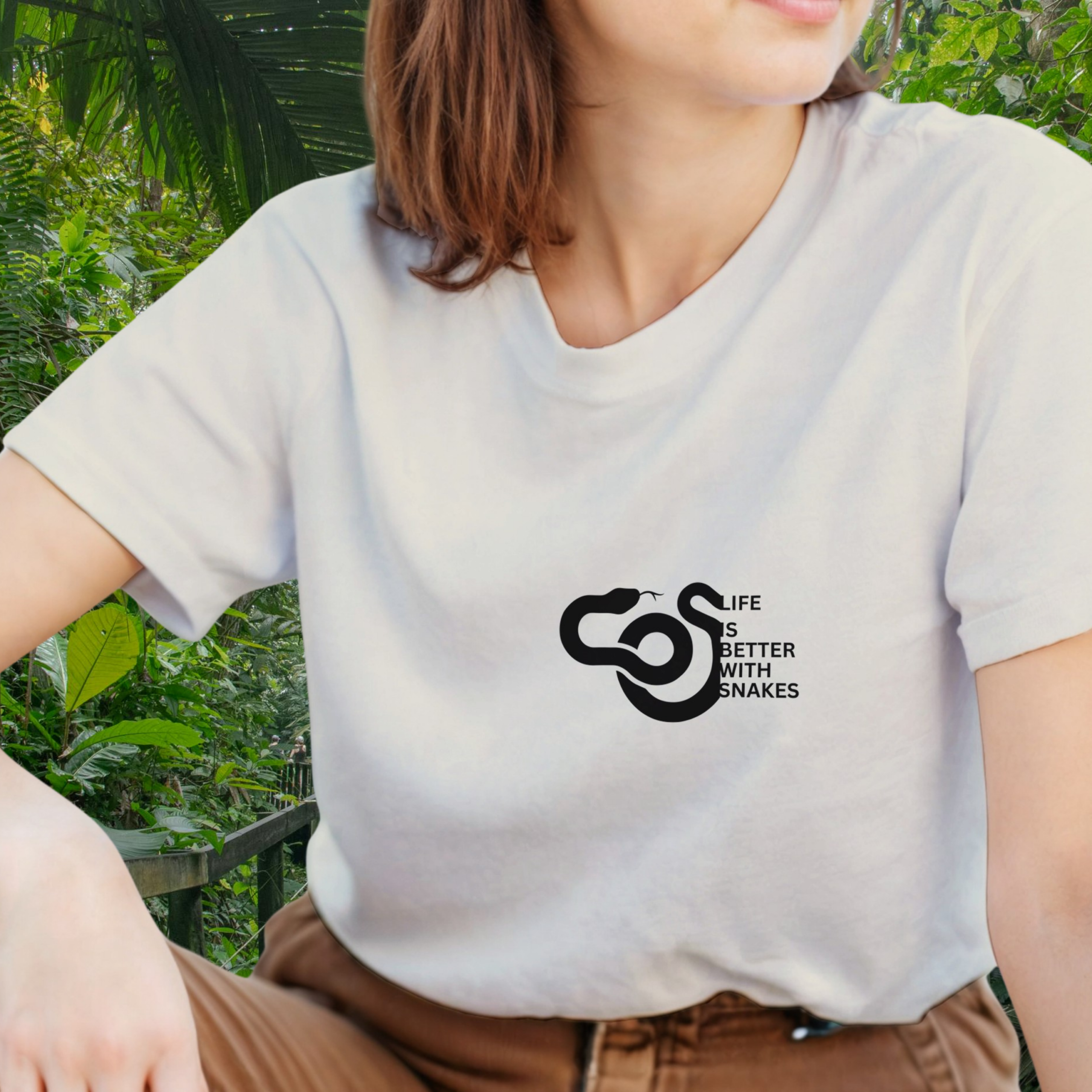 Woman wearing a natural Snakes shirt from the Life is better Collection