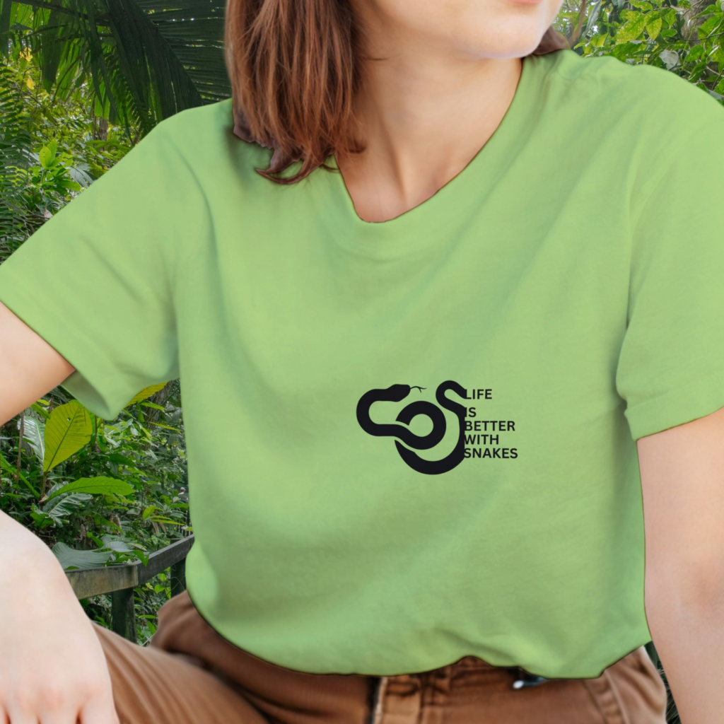 Woman wearing a kiwi Snakes shirt from the Life is better Collection