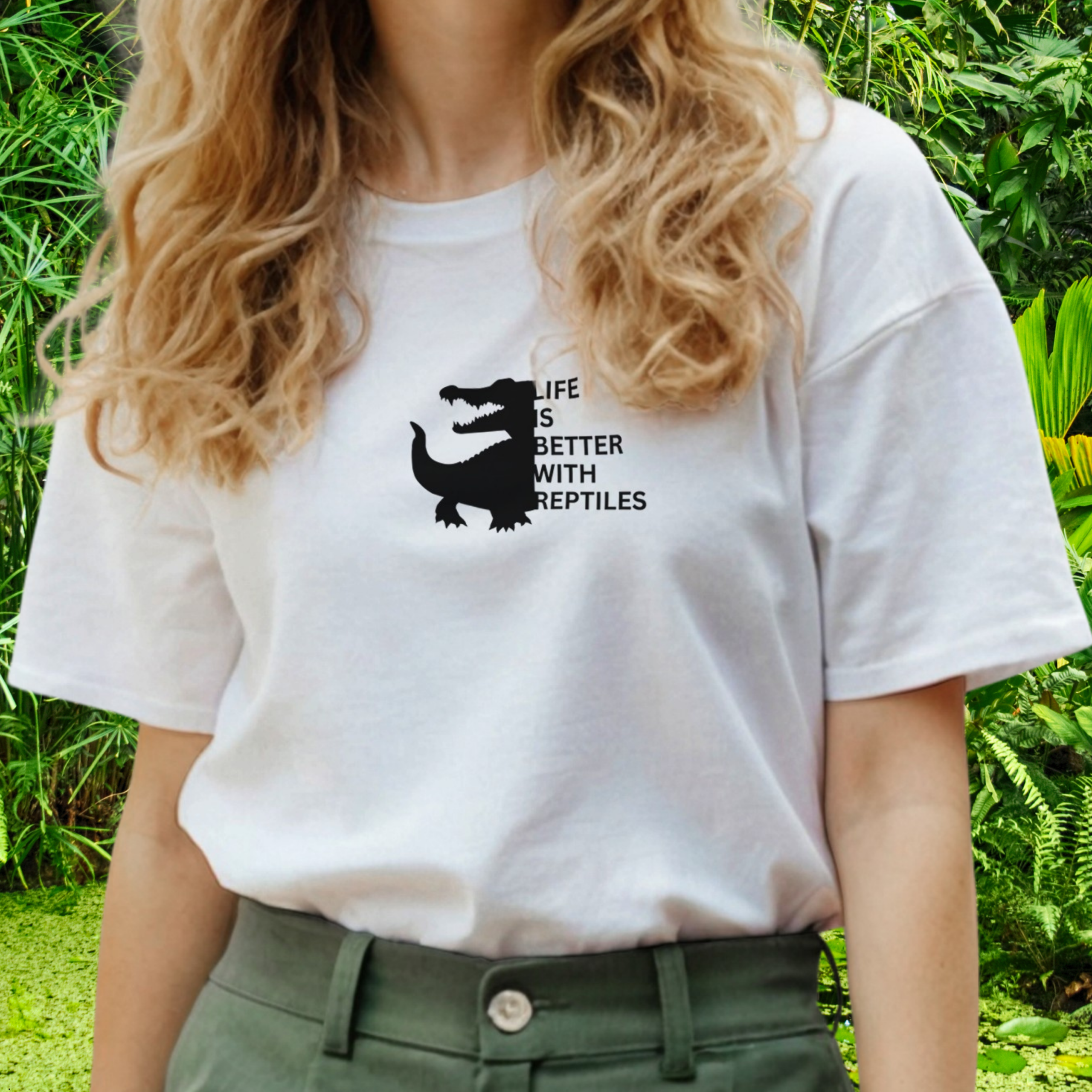 Woman wearing a white Reptile shirt from the Life is better Collection